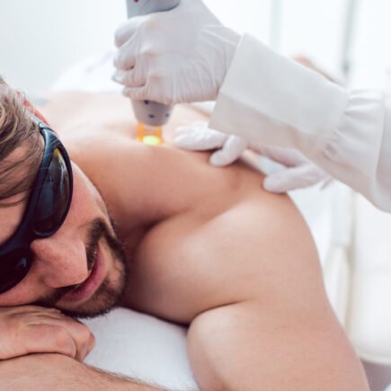 Man in a hair removal studio